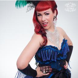 With a fetish for fetish and a deliciously dark side, Trixi Tassels is a world-class tassel twirler, stunning bellydancer, and all-round burlesque beauty.