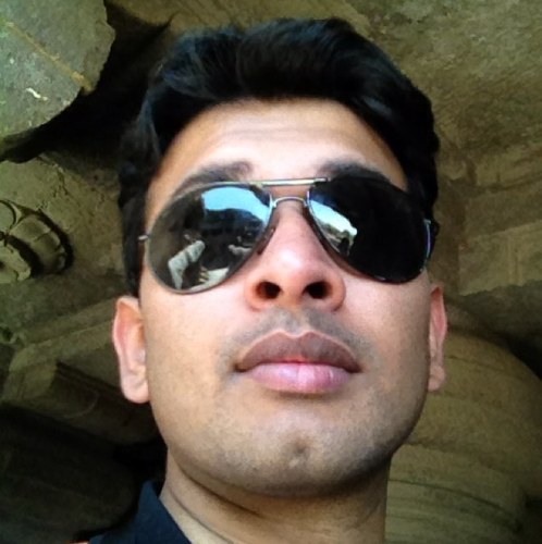 Ardent cricket follower, learning photography and work in bank to make ends meet