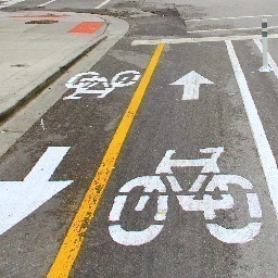 I’m a protected bike lane in Chicago NOW EXTENDED UP TO CHICAGO AVE. Puddled, potholed and kinda narrow but somehow always loved.