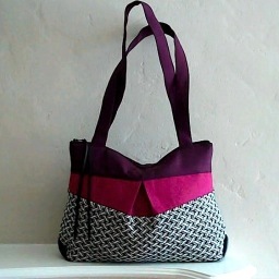 ECOmade bags designed and sewn out of recycled fabric remnants, repurposed genuine leather and upcycled vegan leather alternatives.  http://t.co/0PCjth6I