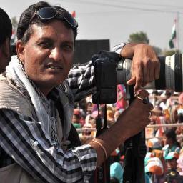 Photographer, The Associated Press ( AP )