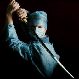 Trauma schock surgeon, hardcore doctor. Tough martial artist. Scientist and musician