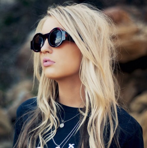 Blonde. Tan. Tattooed.