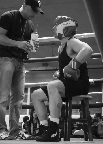 Boxing trainer ,ex-amateur competitor