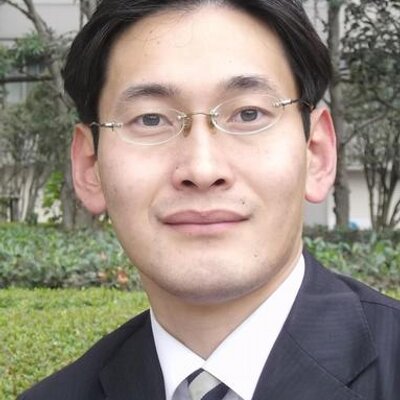 角田芳人