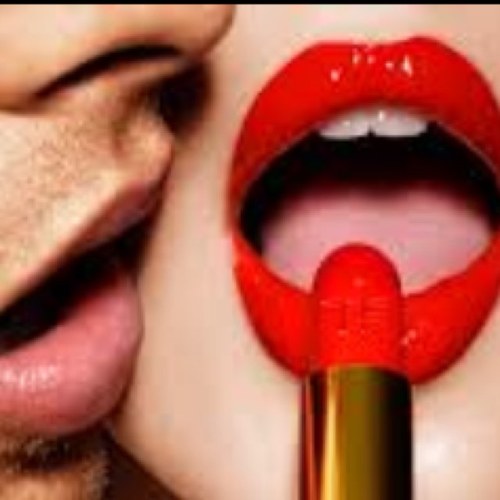 BrunettesInRed's profile picture. Because everyone loves a brunette in red.