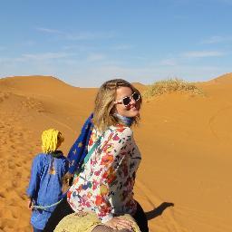 Woman on expedition in the enchanted world of capital markets. 

You can always wake me up to sing, dance or travel.