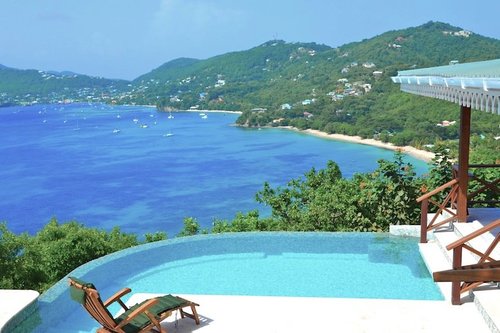 Ravenala is nestled up above lower bay with views over to St Vincent and 3 beautiful bays of Bequia! yours to rent from a day to a few weeks! True Paradise!