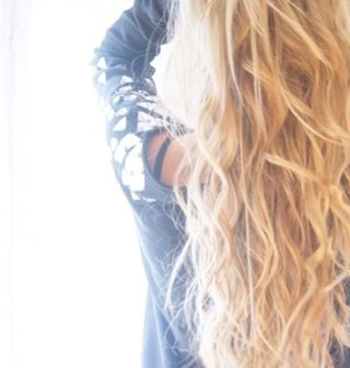 Blonde hair. Blue eyes. Born in California.