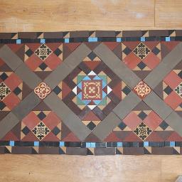 Experts in all aspects of the tiling trade natural stone,glass,mosaics,porcelain and ceramics.Encaustic & Geometric floors.Repair,Restoration,Design & Install