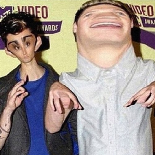 #teambullshit IN love with five beautiful dorks from across the ocean. One Direction smiled at me on 2/30/12 ;D