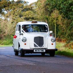 A traditional White London Taxi Cab available for weddings and civil ceremonies across The New Forest, Southampton, Bournemouth, Portsmouth & Salisbury.