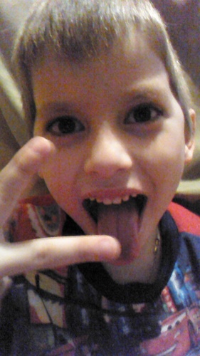 Hello I'm a cute little 6 year old who likes and imitates Justin Bieber