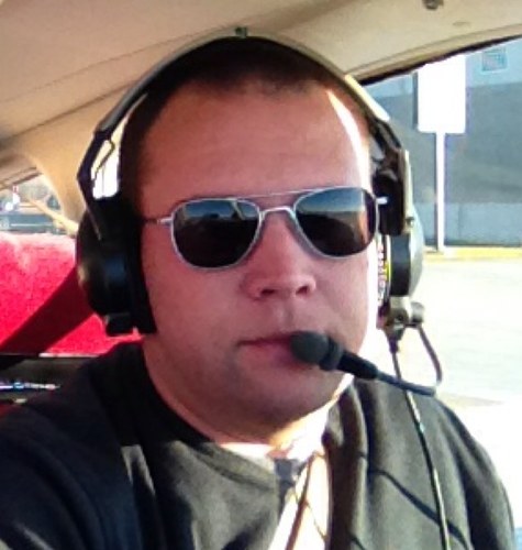 I enjoying flying, playing hockey, and spending time with my family.