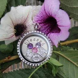 I am an Independent Designer with Origami Owl.  Create your story through this beautiful unique jelwelry.