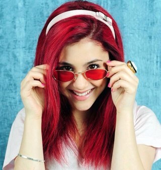 When you look in the mirror and see somone you dont know, its time to get your glasses fixed. You are perfect just the way you are! :]  Singer/Actress