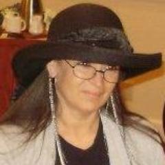 Cracking the Code intuitive Tarot reader, free will advocate, Stevie Ray Vaughan fan, rocks hats, proud introvert, can't get enough dark chocolate