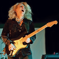 Lead guitarist/vocalist for the Laurie Morvan Band - red hot blues rock!