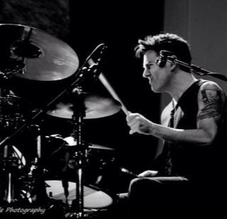 Hello, I'm Glen Power's drums. Glen bangs me everyday and I love him for it.