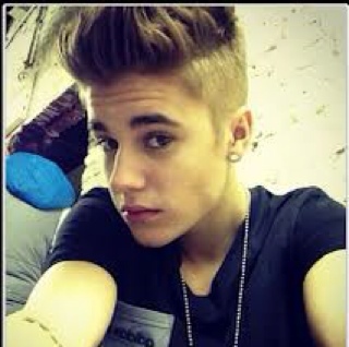 Im Justin I sing/dance/rap I like having fun I can never chill dat much cuz crazy fans always there but I love then beliebers TAKEN father of 3 love them