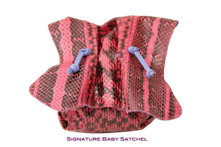 http://t.co/h6Aqxdc4 is a NYC based Designer Handbag and fine art shop.  We sell pieces by Carlos Falchi and friends.