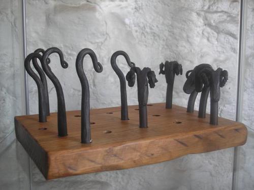 Artist Blacksmith, Heritage Consultant, Canal Boater and GOM trading from Nb Gilda selling hand forged useful things  and bespoke curtains and upholstery