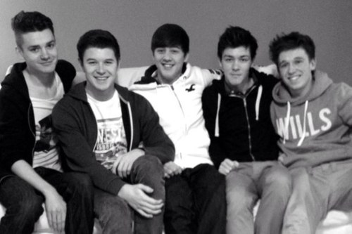 Rewind_England's profile picture. Two girls, supporting five boys..