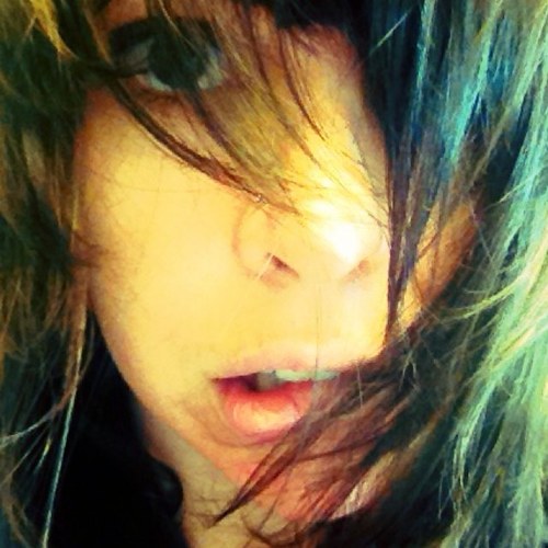 Just a girl with messy hair, a thirsty heart, 
and the mouth of a mother fuckin sailor.