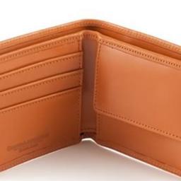 Introducing The Bottomless Wallet - never have to deal with oversized coin pockets any more. Detachable magnetic coin pocket when your wallet gets too hefty.