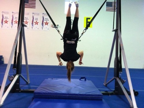 Fully portable cheerleading and gymnastics spotting/training system. 10 level progression system allows athletes to go from %100 spotting to %2 spotting.