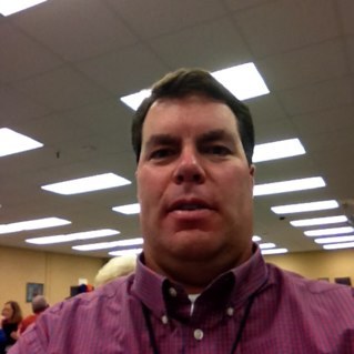 Husband, father to three boys, District Administrator