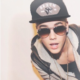 Justin Bieber follows :) Seen him a few times ;) & Met him February 21st 2010, August 31st 2010, June 19th 2012, and June 21st 2012 :D