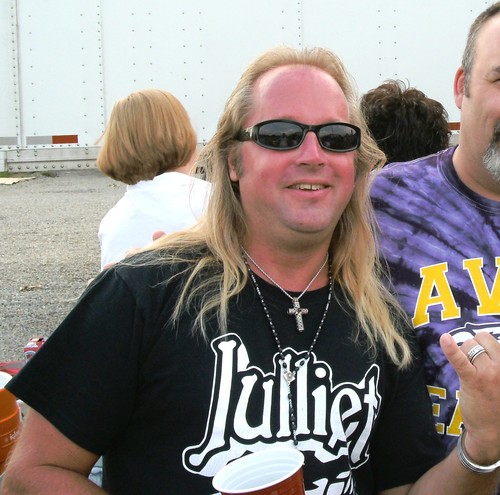 I'm an entreprenuer/inventor, I own my own business restoring classic cars and I'm a pro rock n roll drummer/singer.