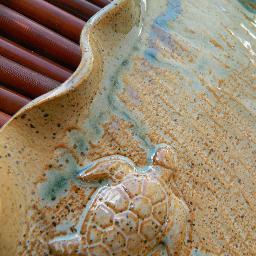 Our pottery has a focus on tropical, beach and pirate themes. All pieces are functional and beautiful. Handmade in the U.S.