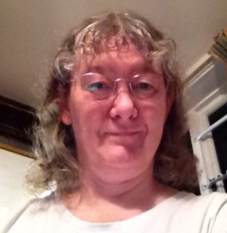 School librarian. Loves: reading, gardening, classical music, animals (keeps hens & whippets)