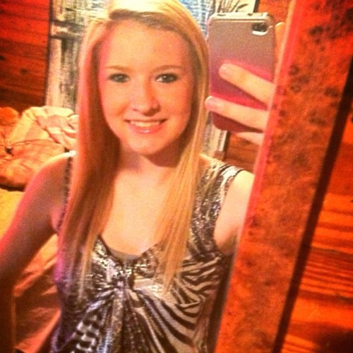 Brother, she's country! From her cowboy boots to her down home roots ;)