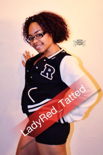 ladyred_tatted's profile picture. 