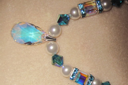 My artistic focus in on exclusive handmade creations of unique one of a kind pieces using Swarovski Crystals & semi-precious stones with sterling silver or gold