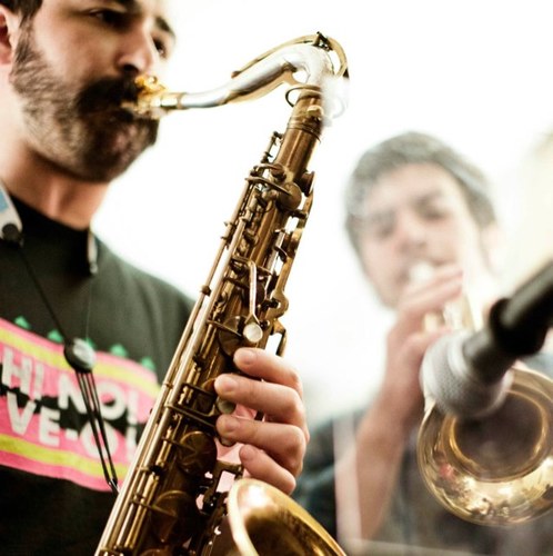 Teach music, have saxophone, play video games.