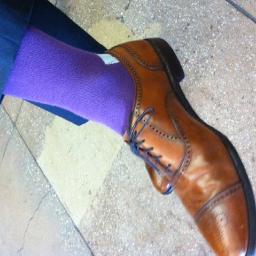 I am Jonathan Perelman's socks. Sometimes I'm striped, solid, plaid or bright. Depends on my mood. Follow me & guess what JP will wear next...