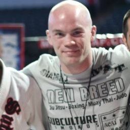 Boxing, BJJ, MMA trainer/coach for professional and amateur fighters, athletes, and enthusiasts at Roots Training Center. NBTC BJJ Black Belt