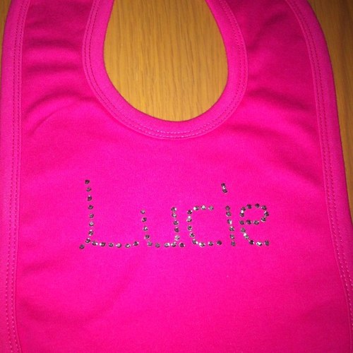 We personalise baby clothes with rhinestones with names or sayings. We have different colour products and rhinestones. Message us if you have any questions :)