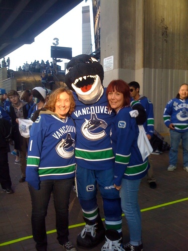 Best friends and devoted Canucks fans = Hockey Hens. One day the hockey room will have pedicure chairs.