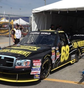 I'm one of the most understated trucks in nascar who is piloted by Clay Greenfield.I am the #68 dodge ram & my sponor is U.S. PavementServices