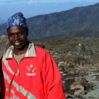 I'm a mountain guide . Mount Kilimanjaro is my office. All views I express are my own and are not that of my employer.