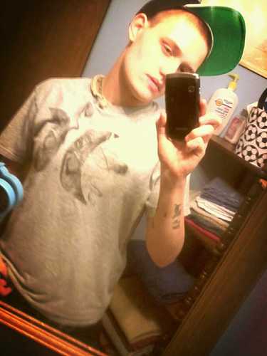 im a country kid stuck in the city tryin to make a livin.
