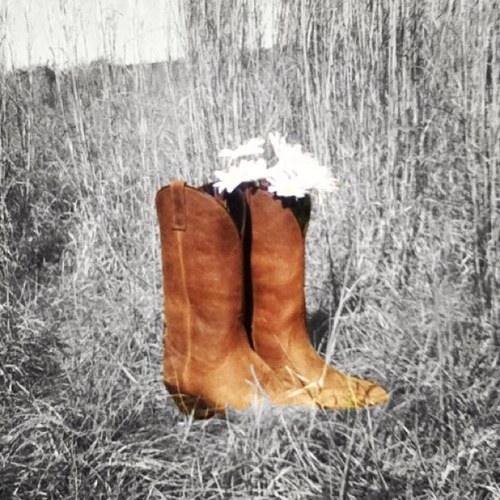 Boots, mud, trucks, sports, and my boyfriend make my world go 'round.
