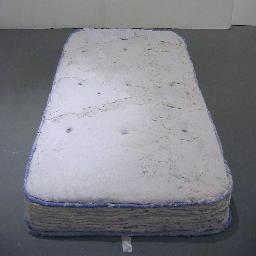 Visual Artist working with human hair and tumble dryer lint.