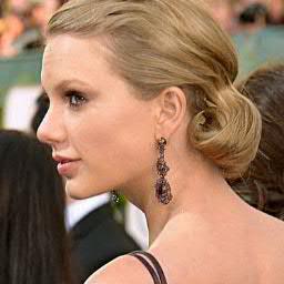 Taylor is the QUEEN! Buy her SLAYING album RED on itunes. if you dont you're basic.