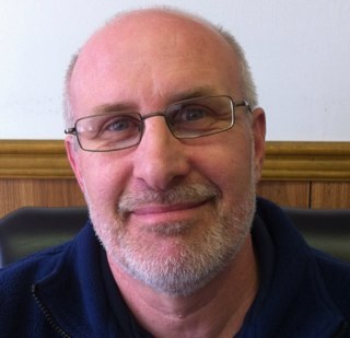 WV 911 Council Executive Director, Christian, WVU ‘82,